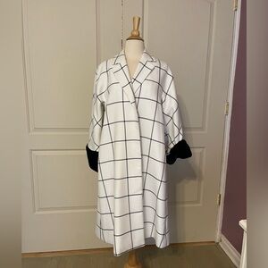 Window pane coat with fur cuffs